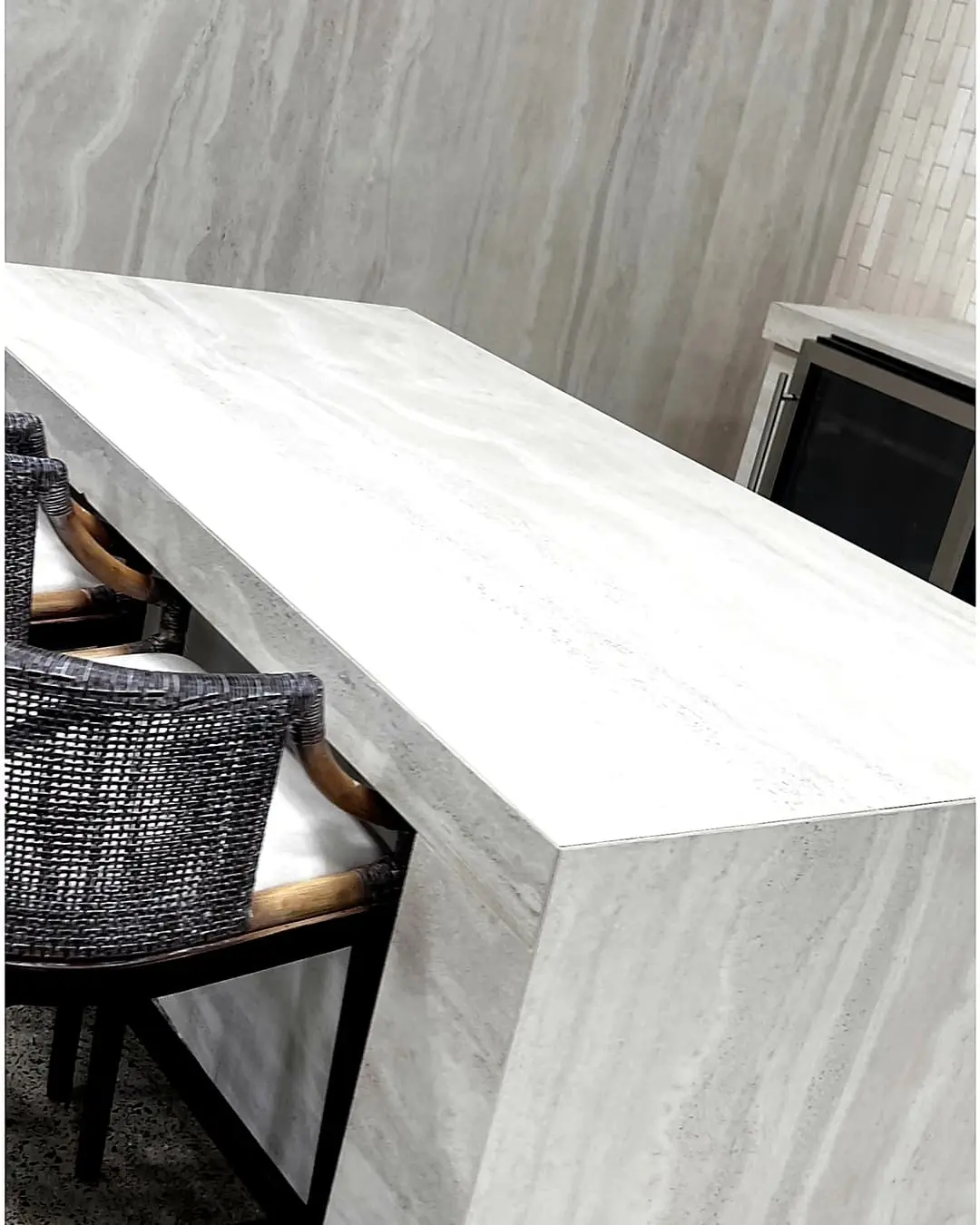 Kitchen bar with stone waterfall countertop